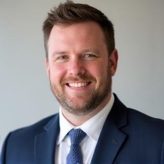 Professional headshot of Benjamin Carter, Pension Transfer Specialist